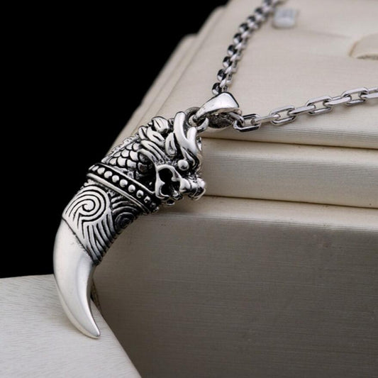 colgante diente dragon