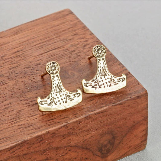 pendientes hacha oro